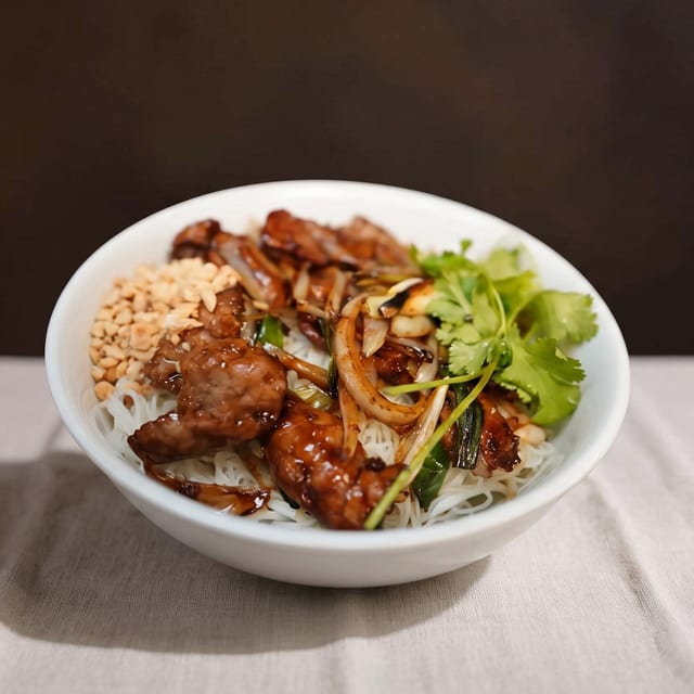 Beef or Chicken Over Rice Noodle Salad.